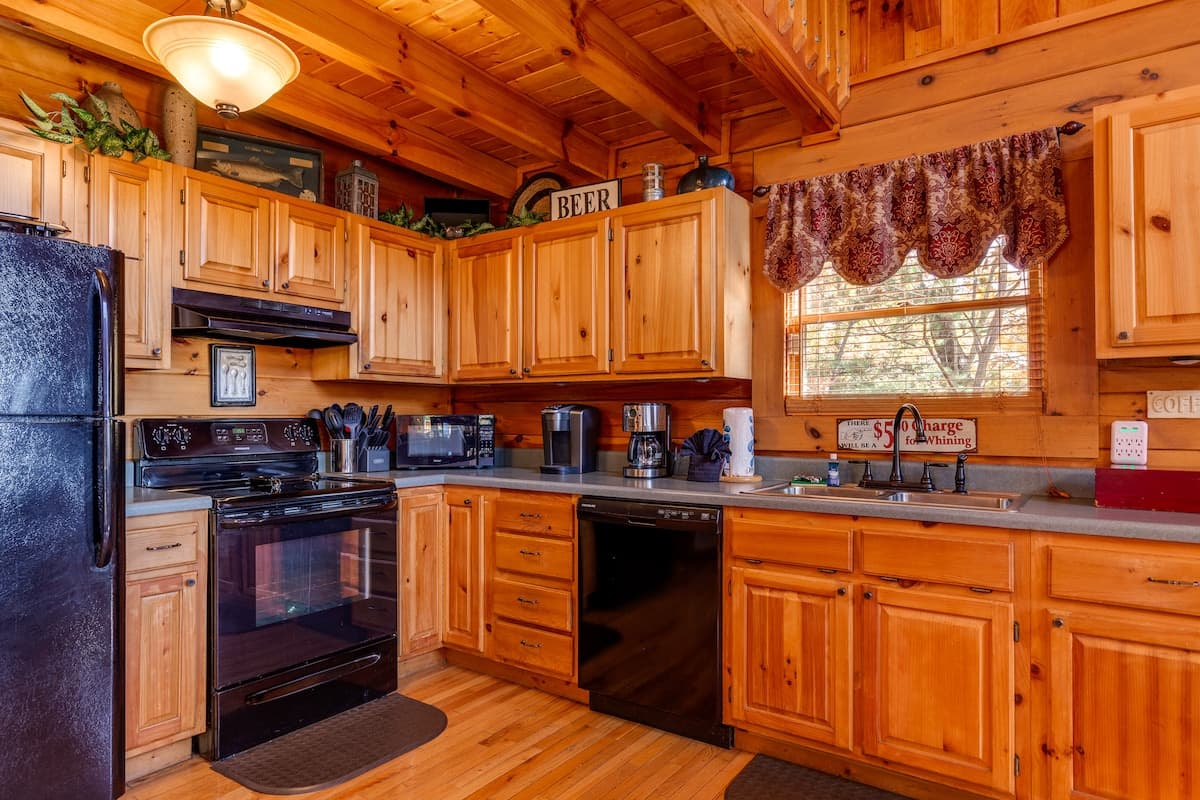 Bathroom with modern amenities and pine cabin walls