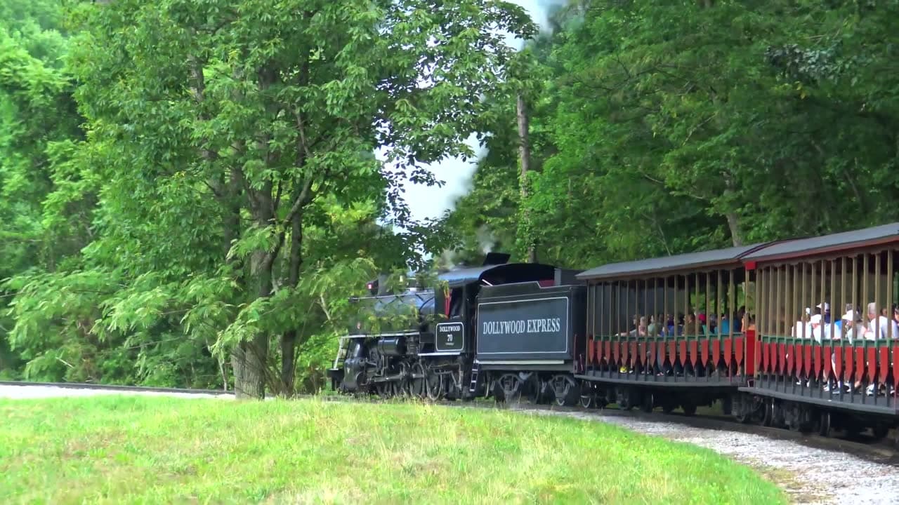 Dollywood Express coal train winding through the trees below the cabin